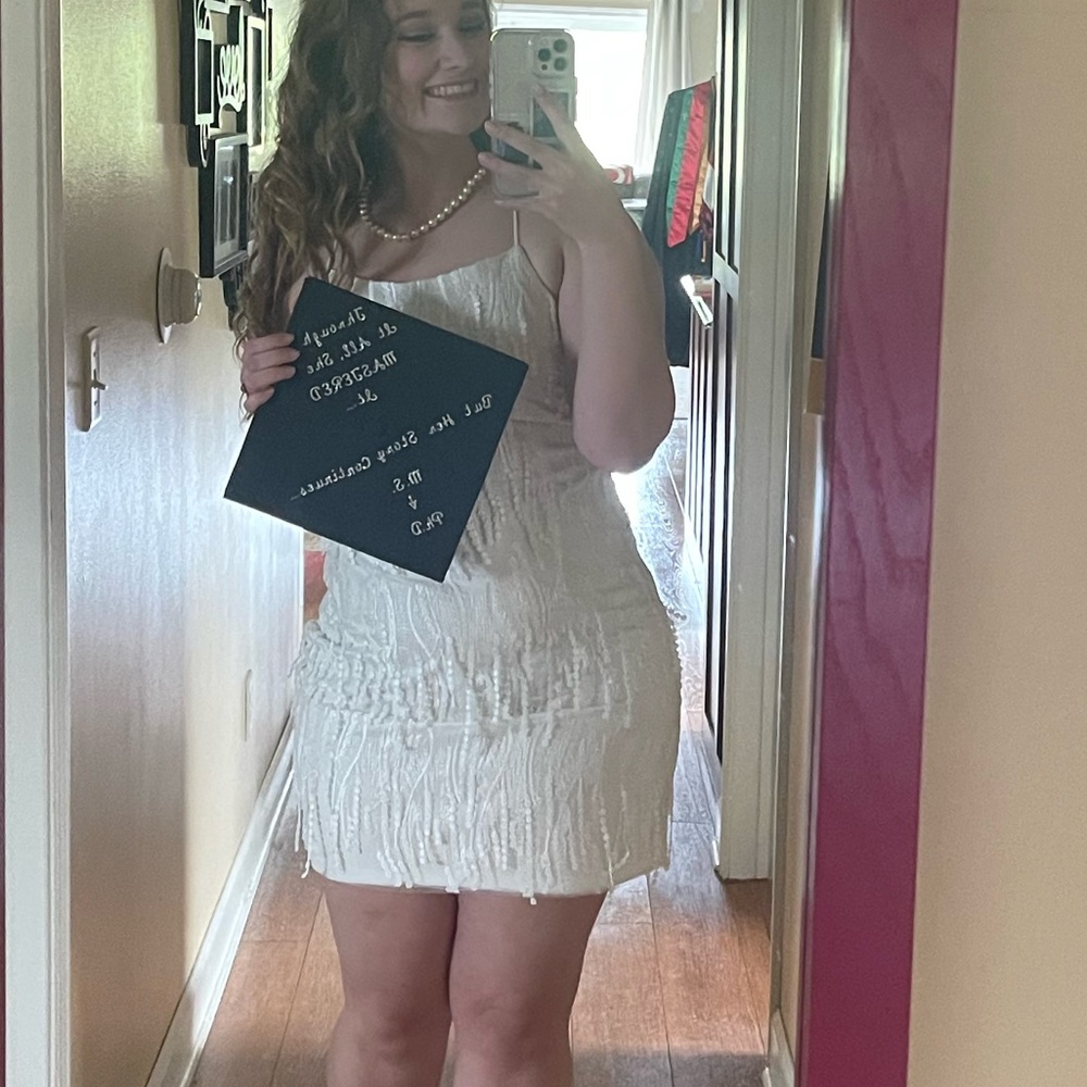 Lulu’s Making Magic White Lace-up Fringe mini dress